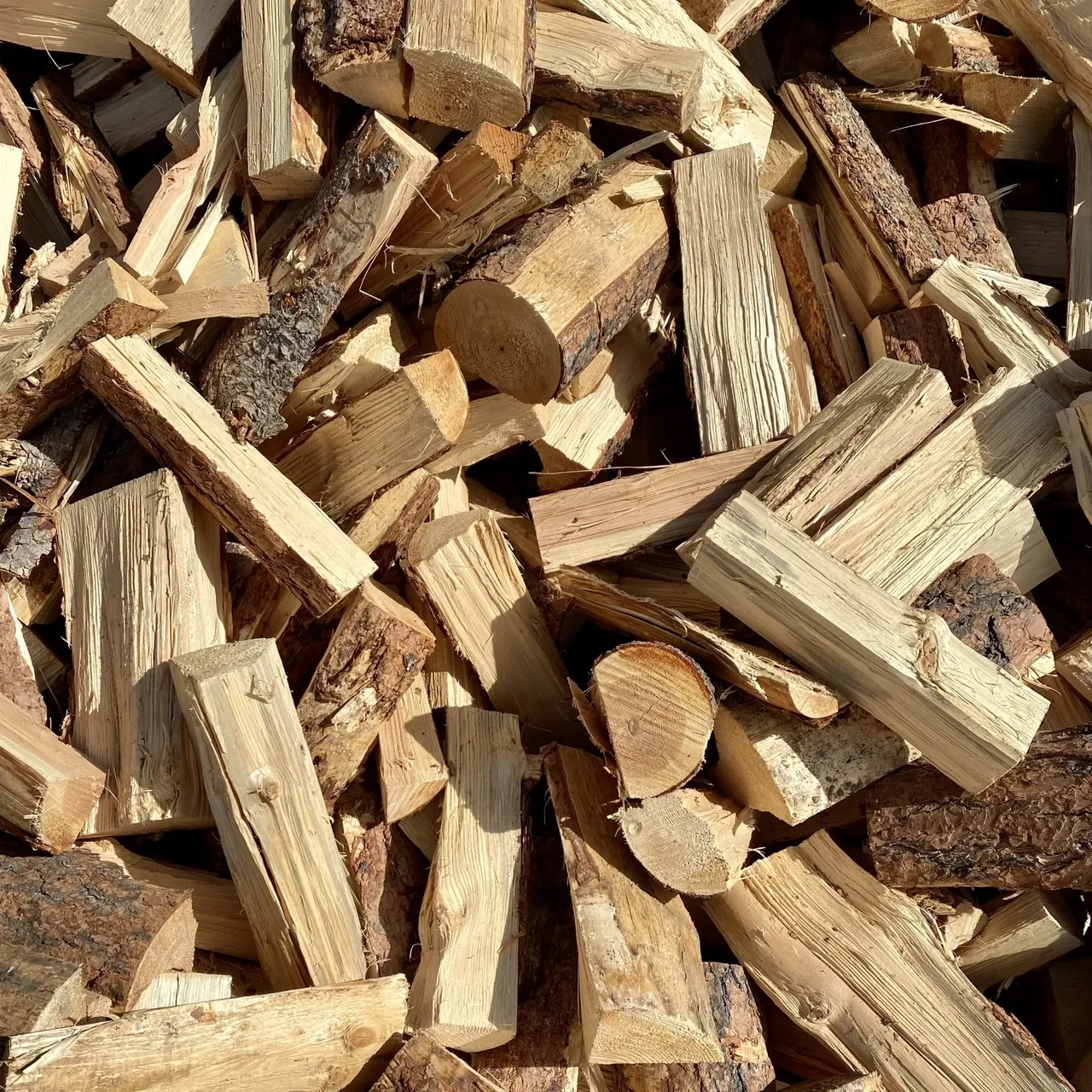 A pile of wood that is chopped up.